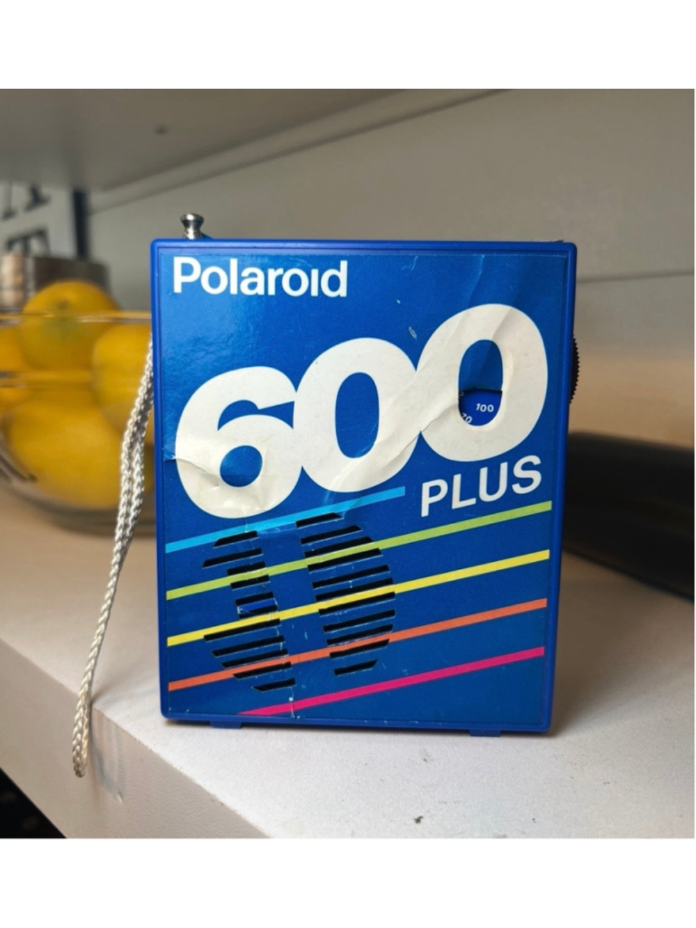 Vintage Polaroid 600 Plus promotional AM/FM novelty transistor radio